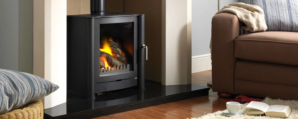 Cosy living room with lit fireplace.